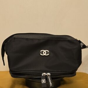 CHANEL Black Toiletry Bag with Silver CC Emblem